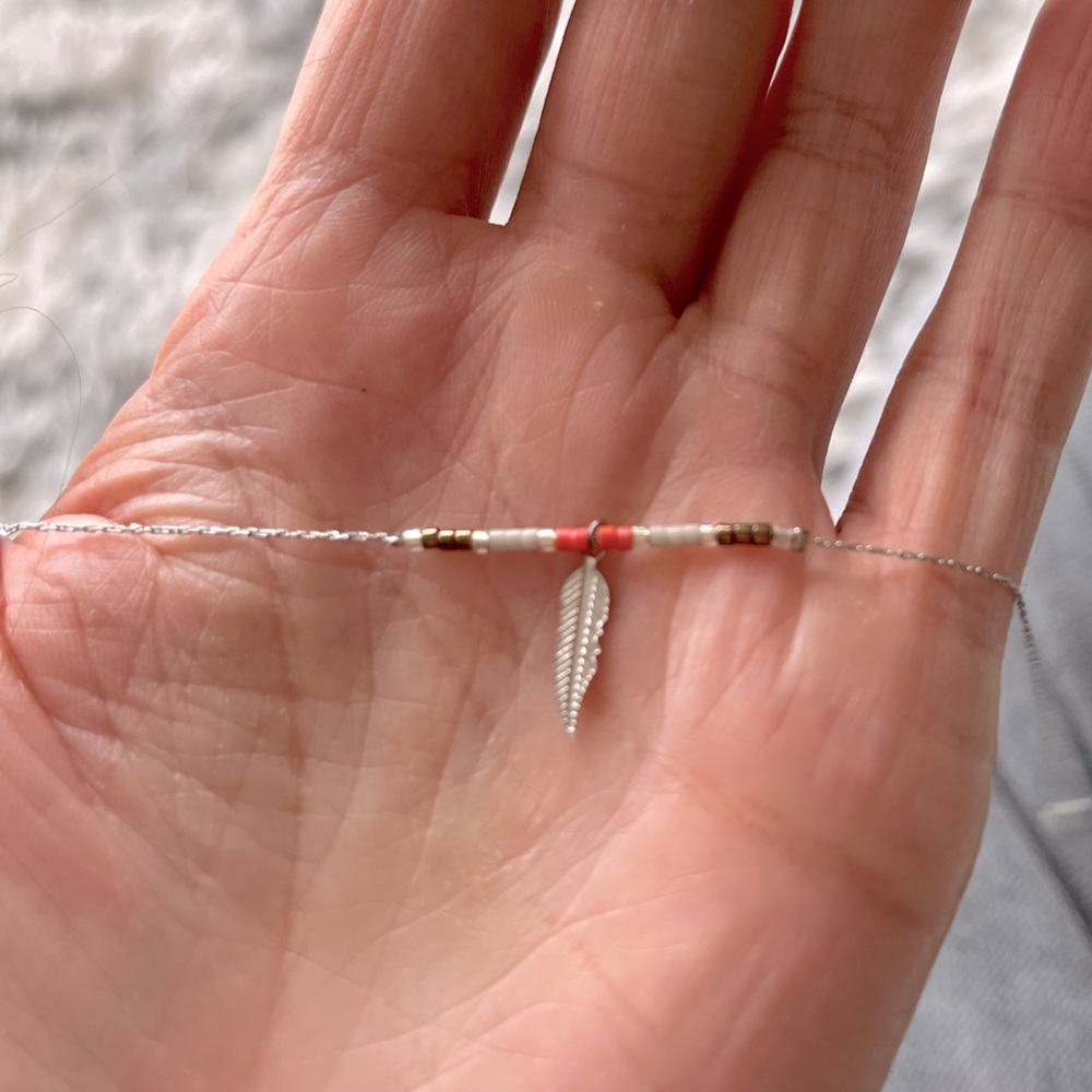 Feather ankle bracelet on thin silver chain with white/red/gray/brown beads